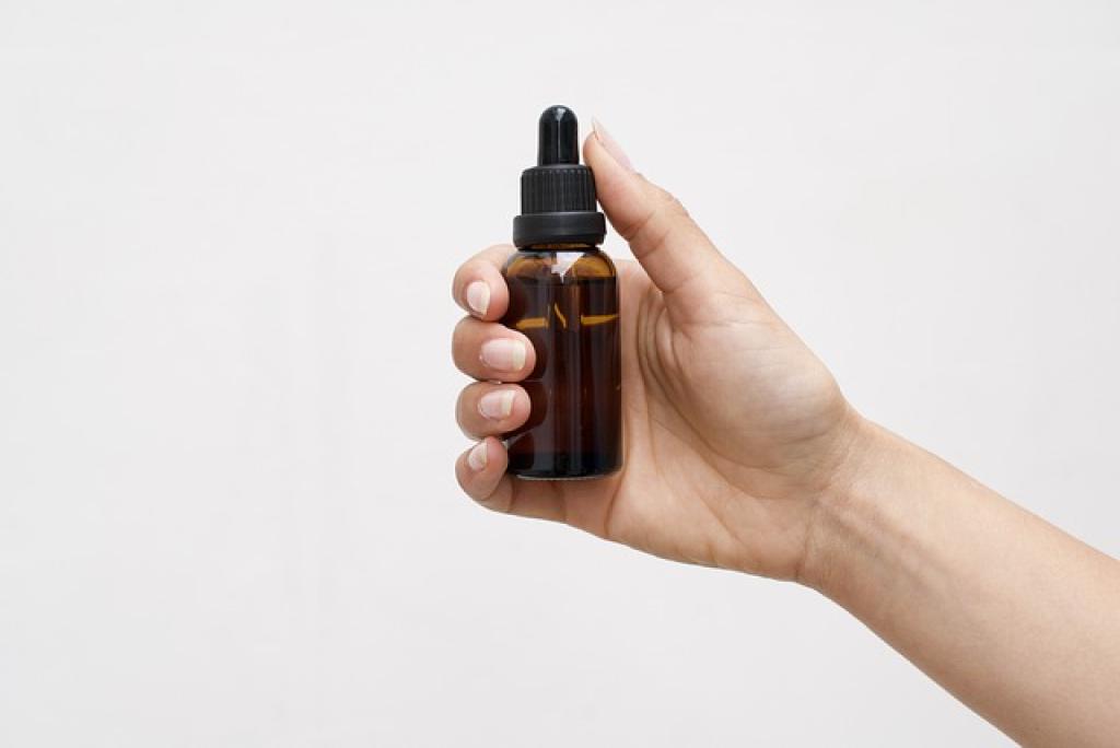 Oil tincture in a bottle with dropper